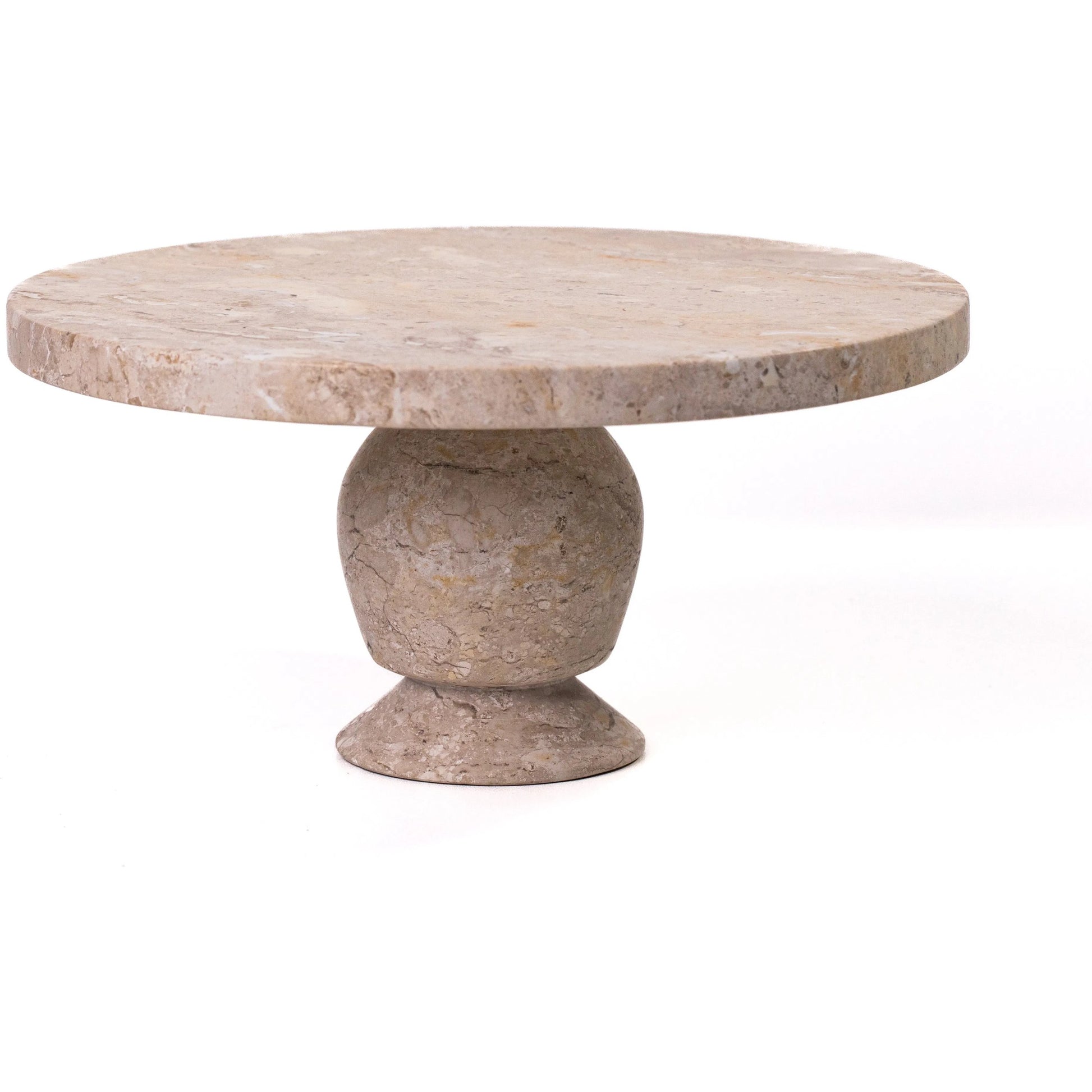 Natural Cake Stand by TOV Furniture in travertine. Made from travertine in a unique style.