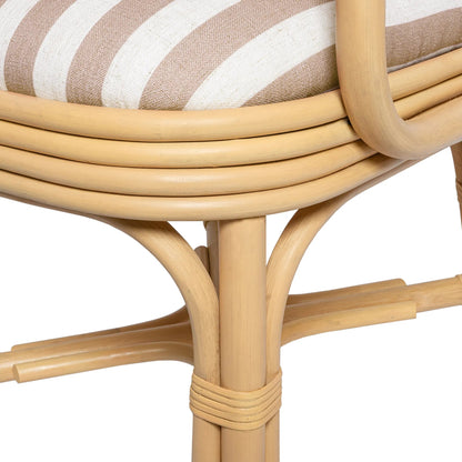 Dorine Striped Performance Linen Dining Armchair by TOV Furniture. Made from fabric, rattan in a unique style.