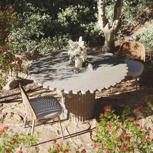 Blossom Washed Finish Indoor / Outdoor Round Dining Table by TOV Furniture in travertine. Made from concrete in a unique style.