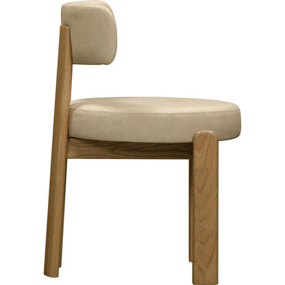 Odessa Vegan Leather Dining Chair by TOV Furniture. Made from faux leather, wood in a transitional style.