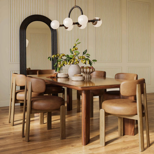 Odessa Vegan Leather Dining Chair by TOV Furniture. Made from faux leather, wood in a unique style.