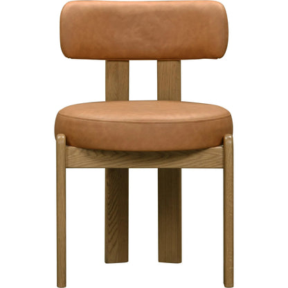 Odessa Vegan Leather Dining Chair by TOV Furniture. Made from faux leather, wood in a transitional style.