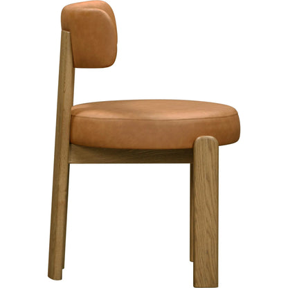 Odessa Vegan Leather Dining Chair by TOV Furniture. Made from faux leather, wood in a transitional style.