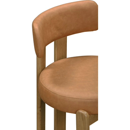 Odessa Vegan Leather Dining Chair by TOV Furniture. Made from faux leather, wood in a transitional style.