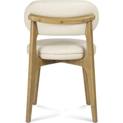 Carnation Performance Vegan Leather Dining Chair by TOV Furniture in cream. Made from plywood, rubberwood, vegan leather in a unique style.