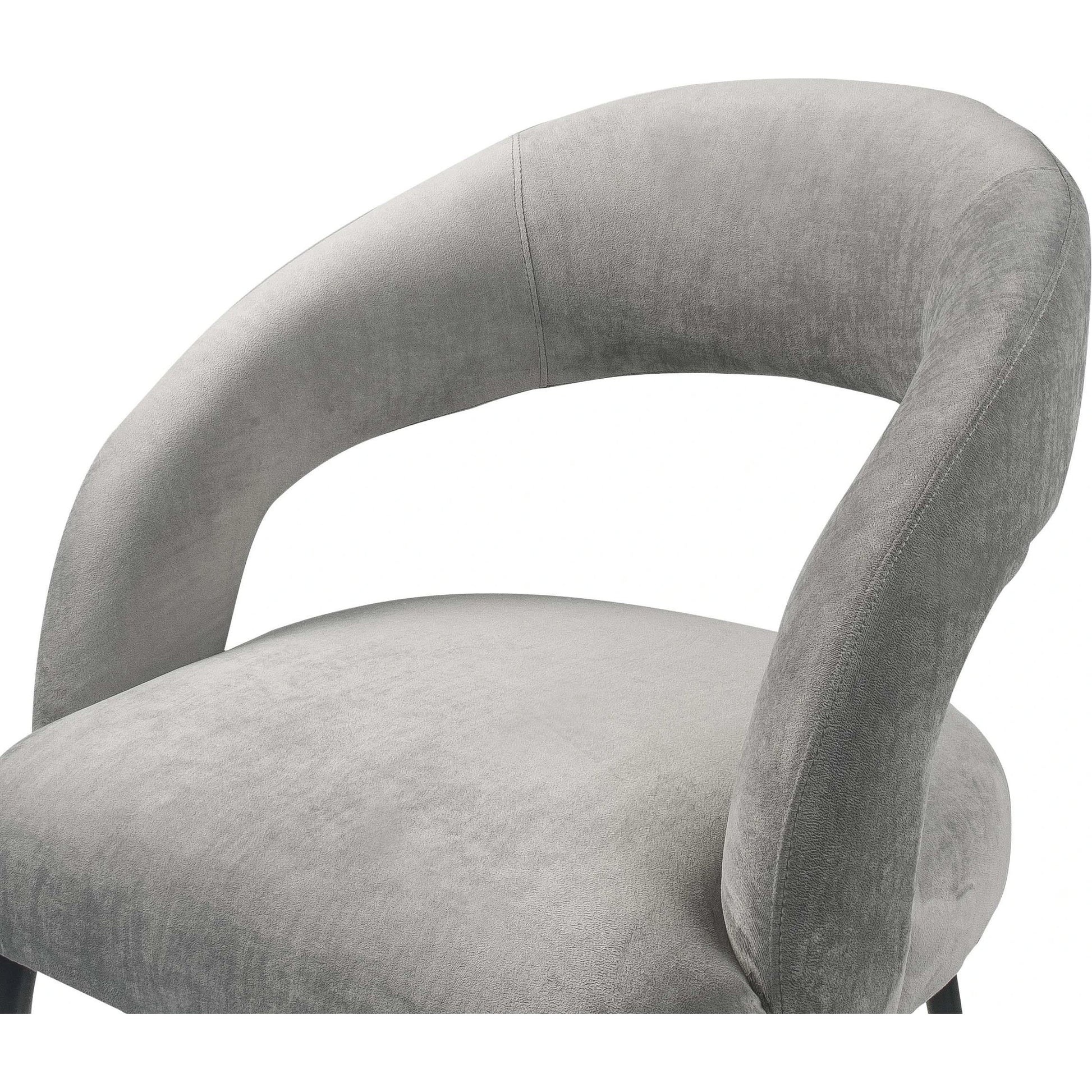 Rocco Dining Chair by TOV Furniture. Made from velvet, pine, stainless steel in a modern style.