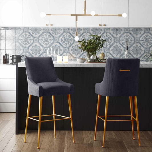 Beatrix Pleated Dark Velvet Bar Stool by TOV Furniture in grey. Made from velvet, pine, stainless steel in a transitional style.