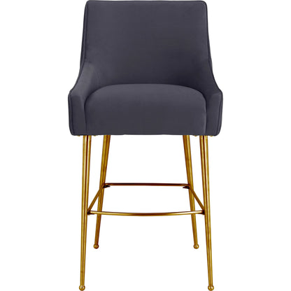 Beatrix Pleated Dark Velvet Counter Stool by TOV Furniture in grey. Made from velvet, pine, stainless steel in a transitional style.