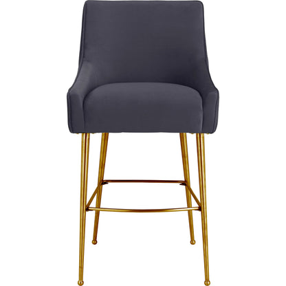Beatrix Pleated Dark Velvet Counter Stool by TOV Furniture in grey. Made from velvet, pine, stainless steel in a transitional style.