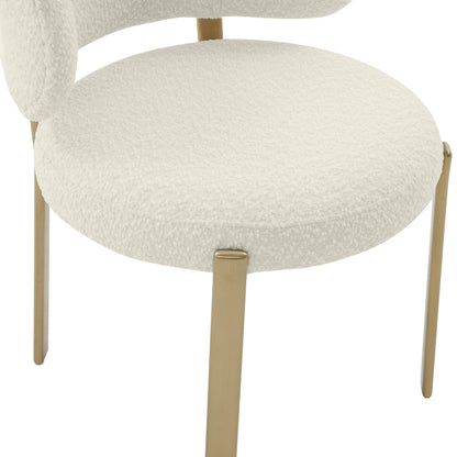 Margaret Boucle Dining Chair by TOV Furniture. Made from boucle, stainless steel, wood in a modern style.