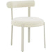 Margaret Performance Chenille Bolster Back Dining Chair by TOV Furniture in cream. Made from fabric, plywood, stainless steel, wood in a eclectic & global style.