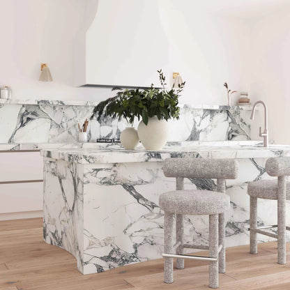 Carmel Performance Boucle Counter Stool by TOV Furniture in black, white. Made from boucle, stainless steel, wood in a transitional style.