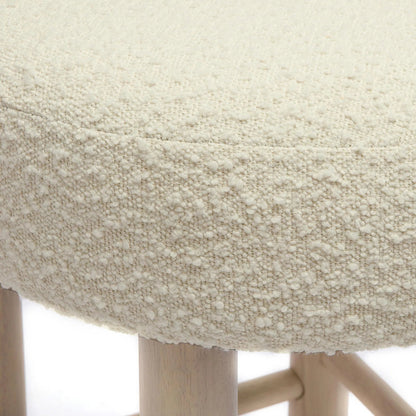 Carmel Boucle and Solid Wood Counter Stool by TOV Furniture in cream. Made from boucle, pine, rubberwood, stainless steel in a transitional style.