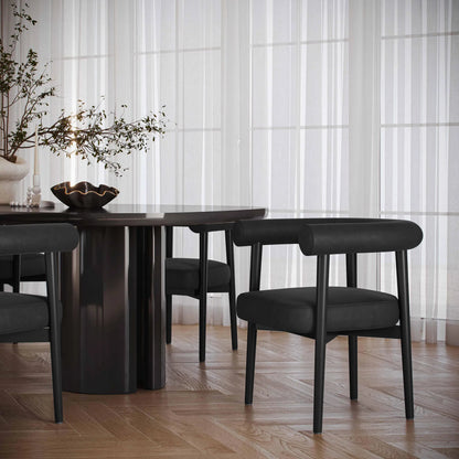 Spara Vegan Leather Dining Chair by TOV Furniture. Made from vegan leather, wood in a modern style.