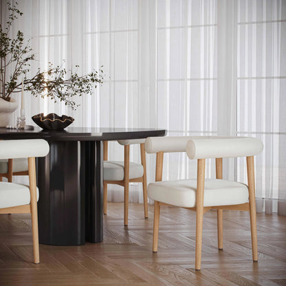 Spara Vegan Leather Dining Chair by TOV Furniture. Made from vegan leather, wood in a modern style.