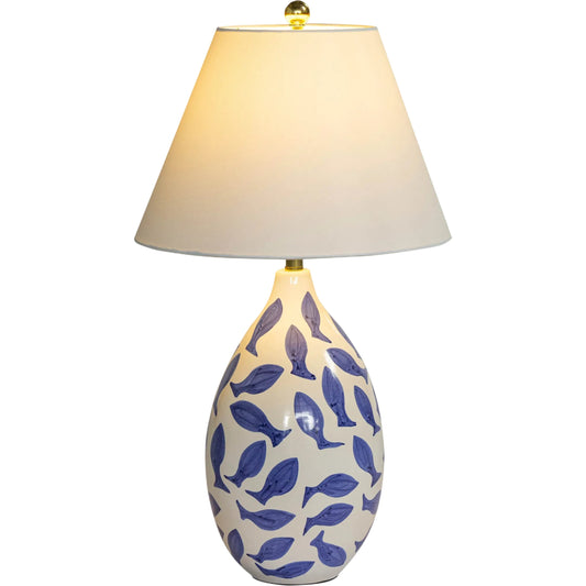 Sardine Table Lamp by TOV Furniture in blue, white. Made from ceramic, fabric, metal in a unique style.