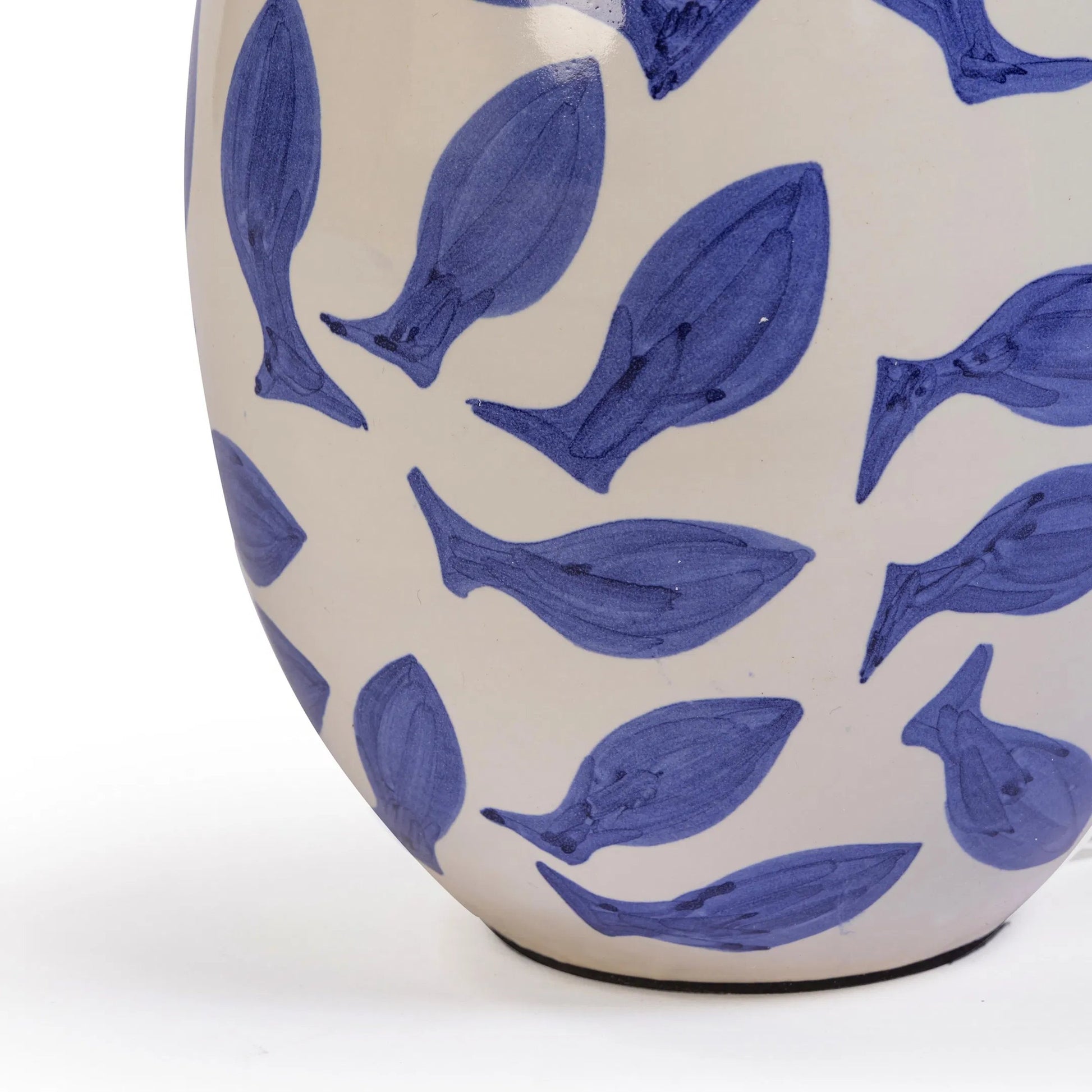 Sardine Table Lamp by TOV Furniture in blue, white. Made from ceramic, fabric, metal in a unique style.