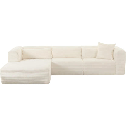 Tarra Fluffy Oversized Corduroy Modular LAF Sectional by TOV Furniture. Made from corduroy, wood in a transitional style.