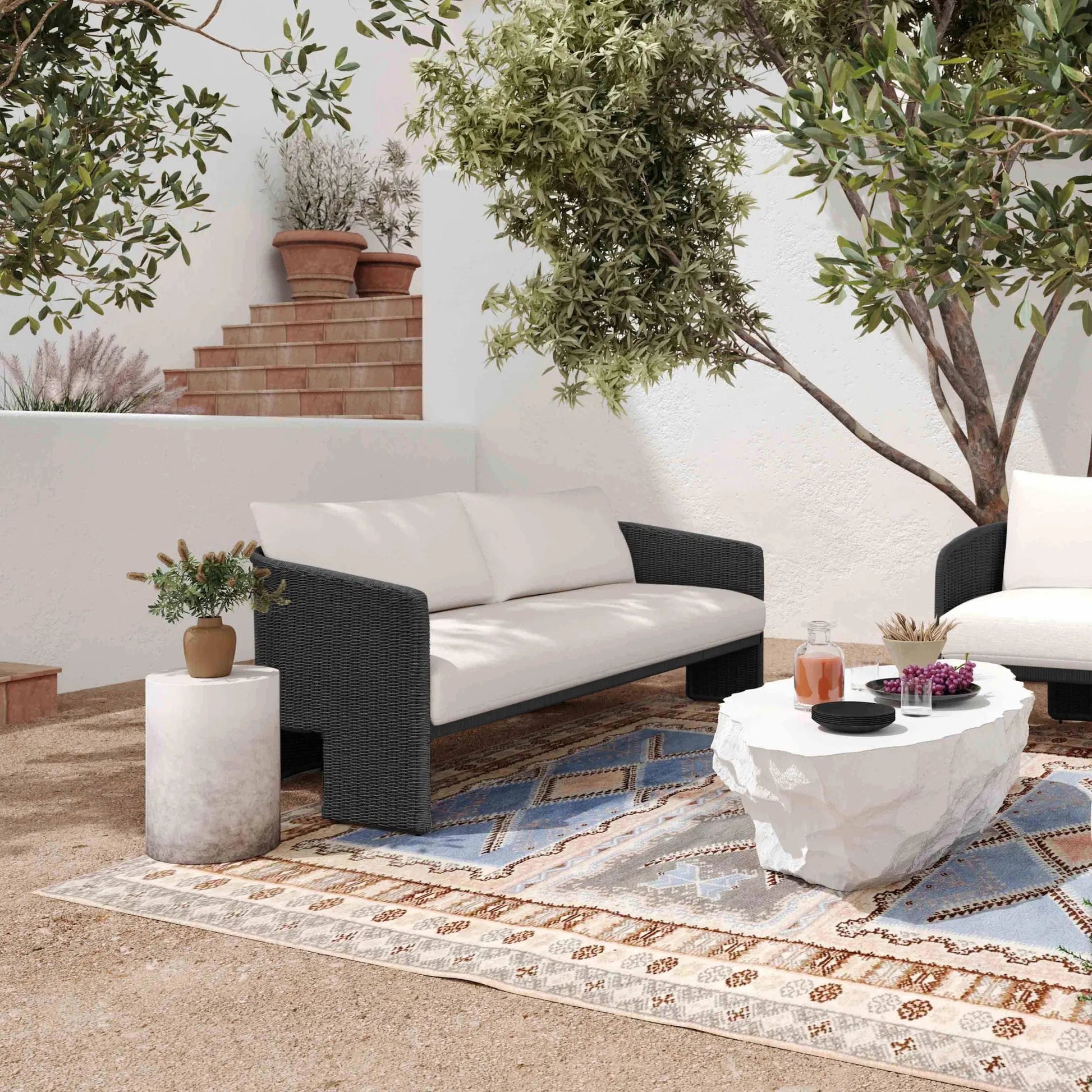 Alexa Performance Fabric Outdoor Sofa by TOV Furniture in black. Made from aluminum, polyester, wicker in a rustic style.