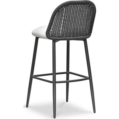 Alexa Performance Fabric Outdoor Bar Stool by TOV Furniture in black. Made from aluminum, polyester, wicker in a rustic style.