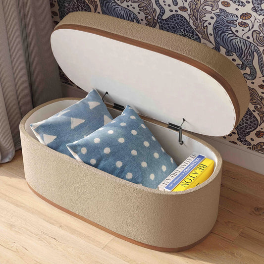 Olivier Boucle Oval Storage Ottoman by TOV Furniture. Made from boucle, wood in a unique style.