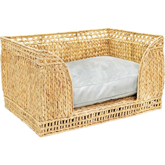 Milou Rattan Pet Bed by TOV Furniture in natural. Made from natural cane in a unique style.