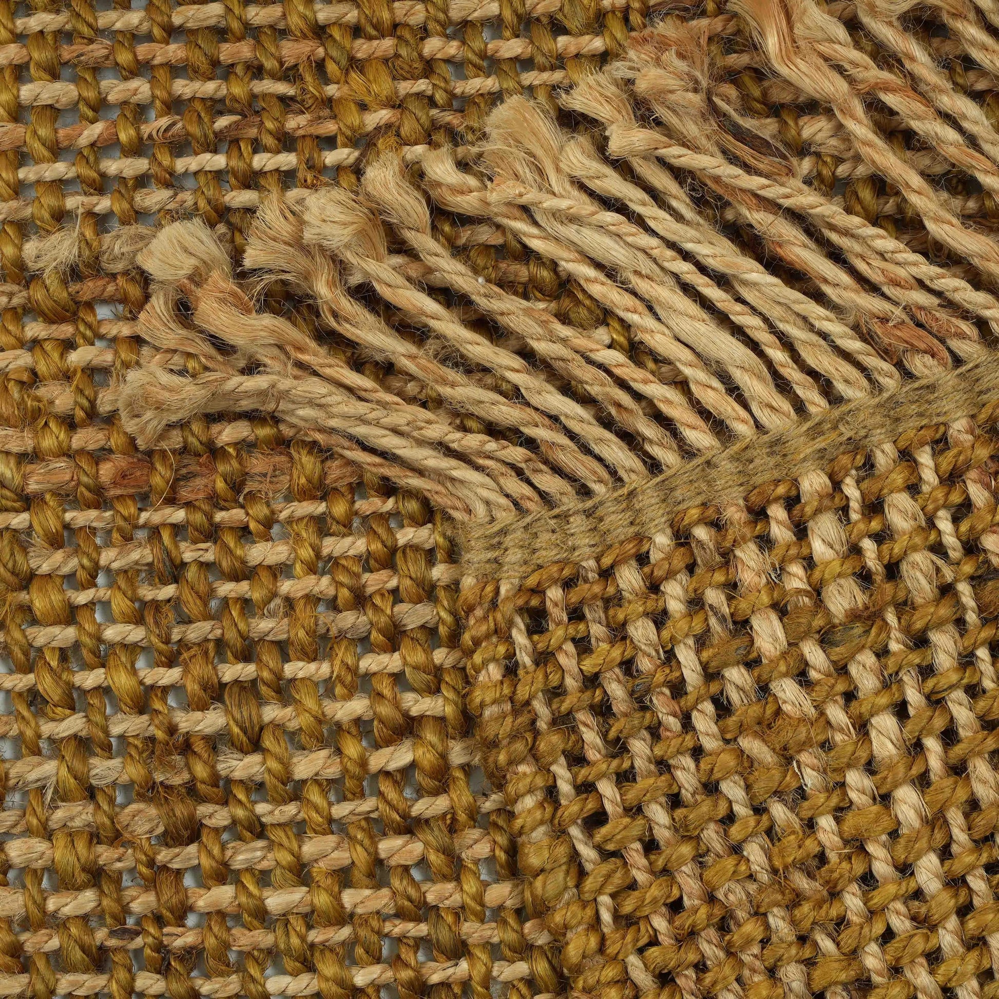 Mata Area Rug by TOV Furniture in natural. Made from jute in a unique style.