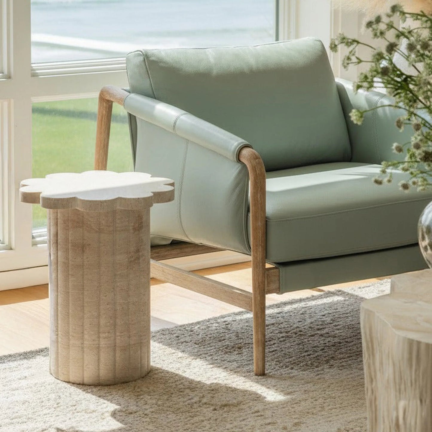 004 SI-2519381 | Lifestyle | Blossom Faux Indoor/Outdoor Side Table by TOV Furniture in travertine. Made from concrete in a transitional style.