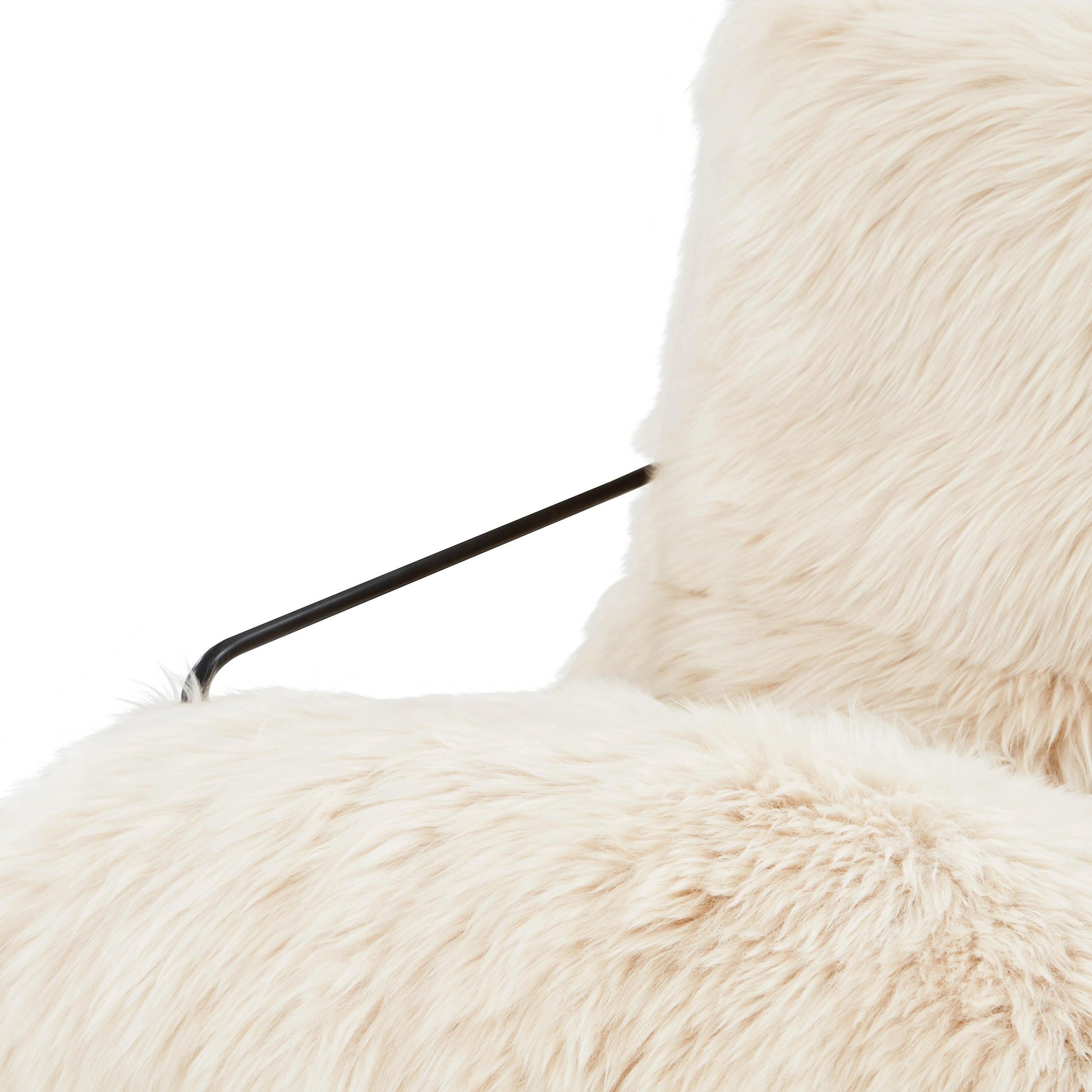 Kimi Genuine Sheepskin Chair by TOV Furniture. Made from iron, sheepskin, wood in a modern style.