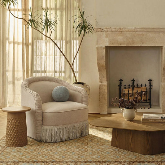 Pamela Chenille Lounge Chair by TOV Furniture in tan. Made from fabric, plywood, tassel in a unique style.