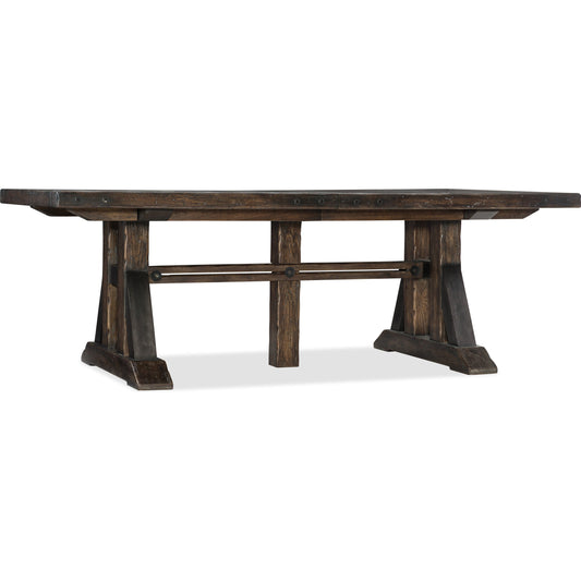 Roslyn County Trestle Dining Table by Hooker Furniture in dark walnut. Made from black walnut veneers, aluminum sheet in a traditional style.