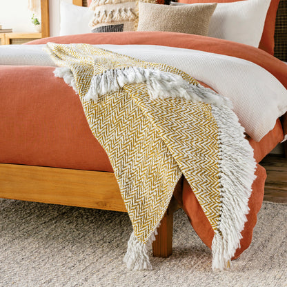 Trina - 14396 by Surya in gold, ivory, charcoal. Made from 90% acrylic, 10% polyester in a traditional style.