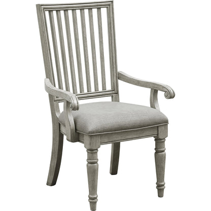 Madison Ridge Arm Chair by Pulaski Furniture in bluff grey. Made from asian hardwood, oak veneers, fabric in a traditional style.