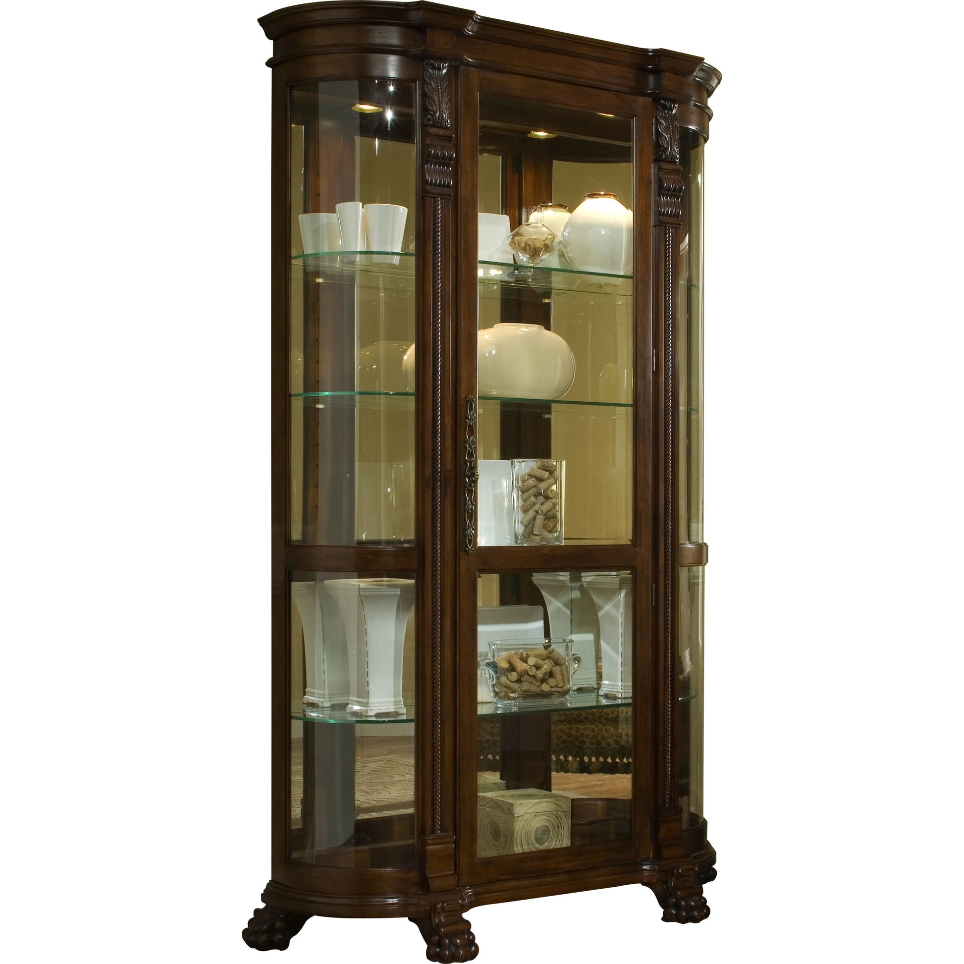 Curved End Curio by Pulaski Furniture in warm maple brown. Made from select hardwood solids, veneers in a traditional style.