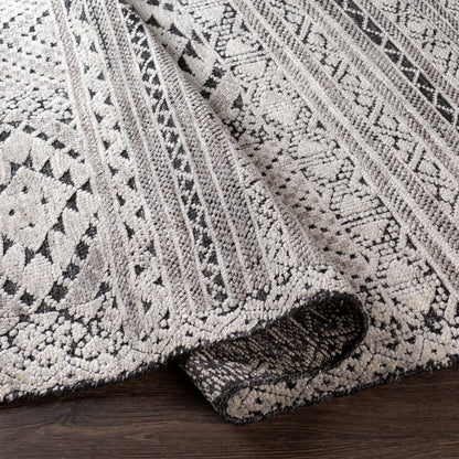Tunus TUN-2304 Indoor/Outdoor Rug by Surya in black, off-white, charcoal. Made from 70% new zealand wool, 30% viscose in a unique style.