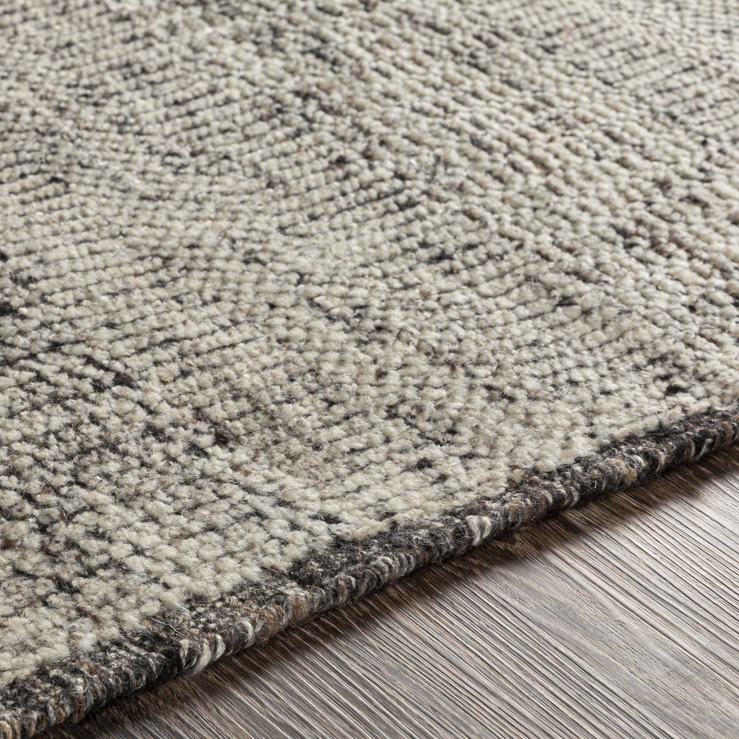005 SR-881169,SR-881171,SR-881172 | Closeup | Tunus TUN-2305 Rug by Surya in gray, off-white, black, light sage. Made from 80% new zealand wool, 20% viscose in a unique style.