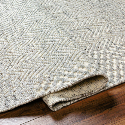 Tunus TUN-2312 Rug by Surya in light gray, ivory. Made from main: 100% wool in a unique style.