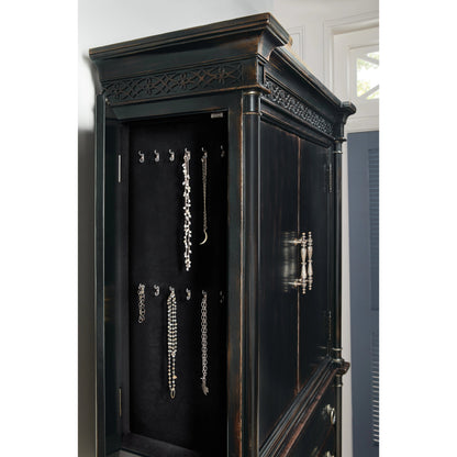 Charleston Jewelry Armoire by Hooker Furniture in black cherry. Made from cherry veneers, cedar, metal in a traditional style.