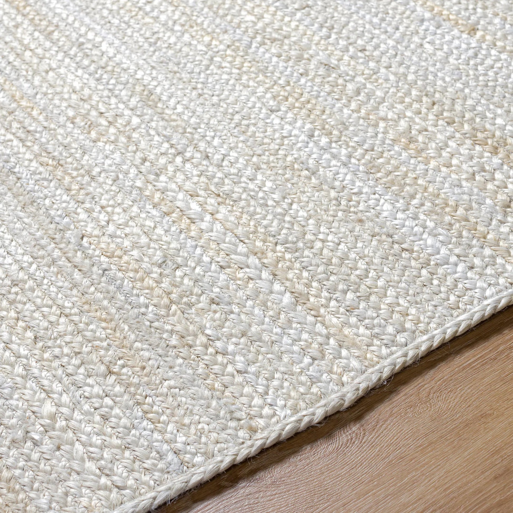 Trenzado Rug - 32493 by Livabliss in beige. Made from main: 100% jute in a unique style.