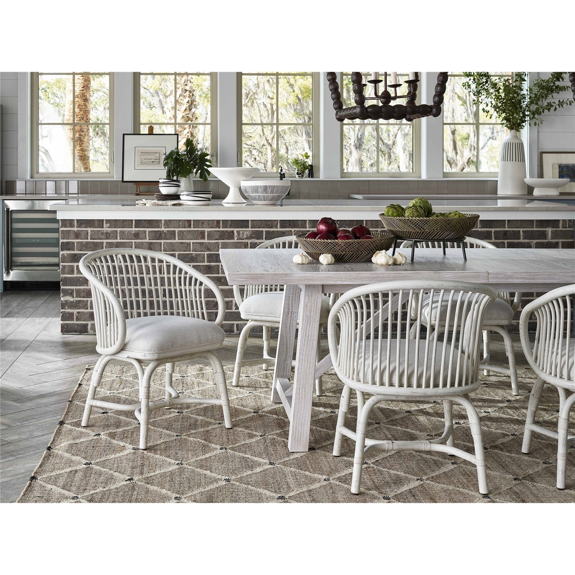 Aruba Rattan Chair by Coastal Living by Universal Furniture in nomad snow and egret. Made from 92% polyester, 8% linen in a coastal style.