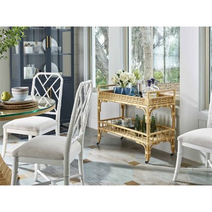 5 O'Clock Bar Cart by Coastal Living by Universal Furniture in antique brass and natural rattan. Made from unique in a coastal style.