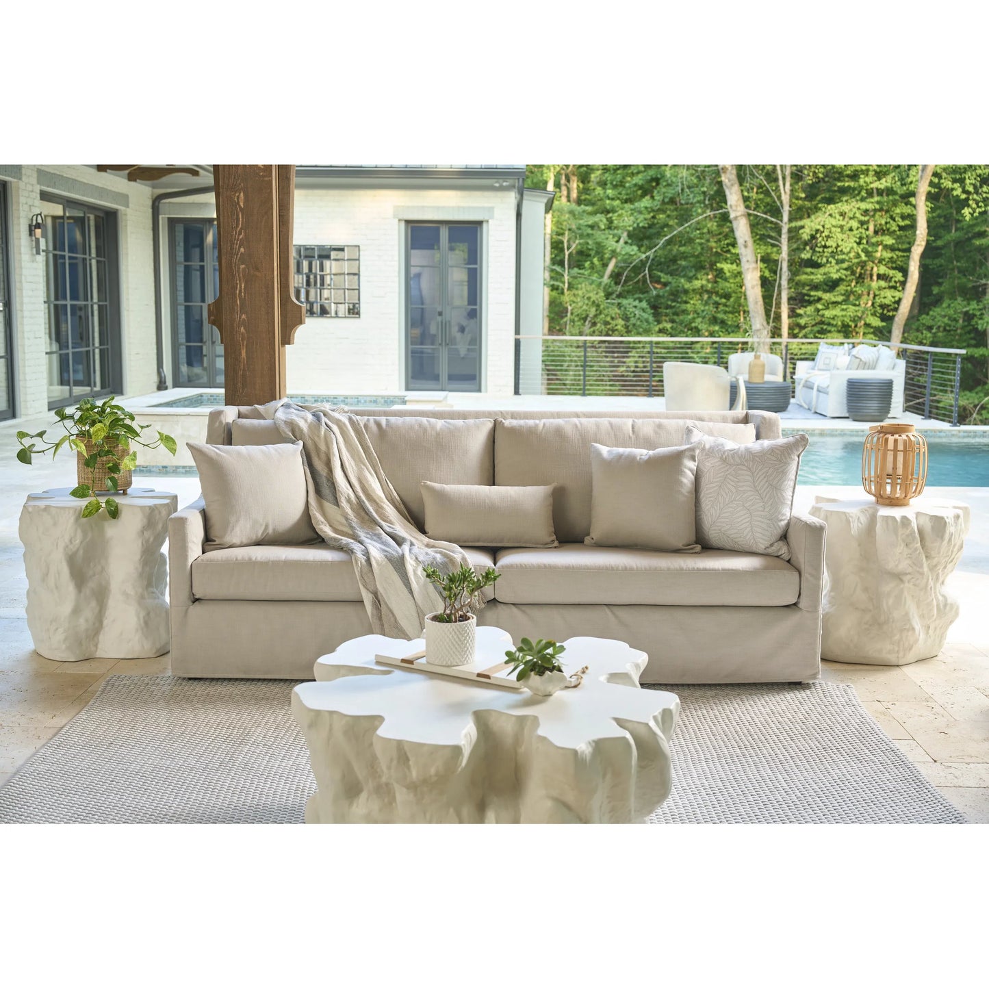 003 SI-2473050 | Lifestyle | Oasis Cliffside Cocktail Table by Coastal Living by Universal Furniture in white. Made from unique in a cottage & farmhouse style.