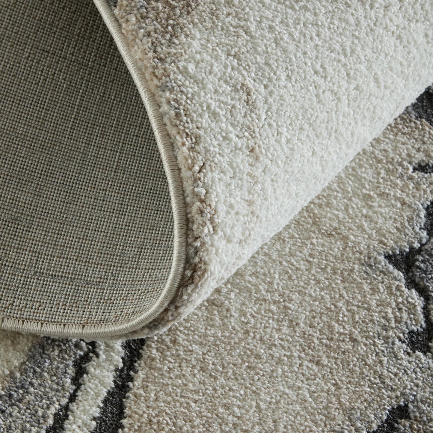 005 SI-2635537,SI-2635538,SI-2635539,SI-2635540,SI-2635541 | Closeup | Gilmore GIL39URF Rug by Feizy in ivory, gray, black. Made from polypropylene in a unique style.