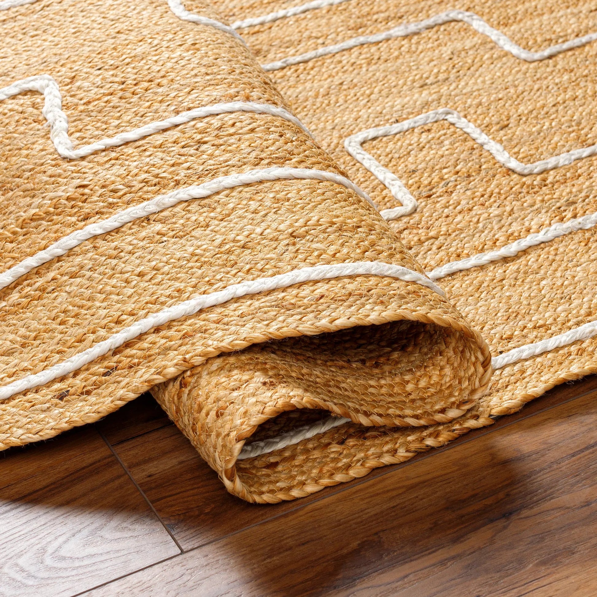 Luci UCI-2302 Indoor/Outdoor Rug by Livabliss in tan. Made from main: 100% jute in a unique style.