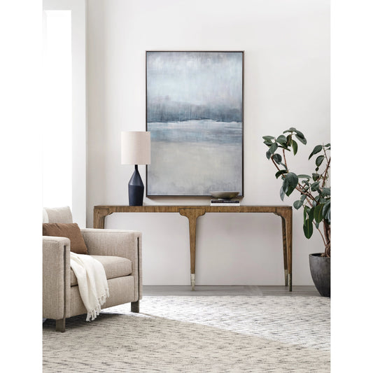 Chapman Console Table by Hooker Furniture in sorrel. Made from white oak veneers, metal ferrules in a modern style.