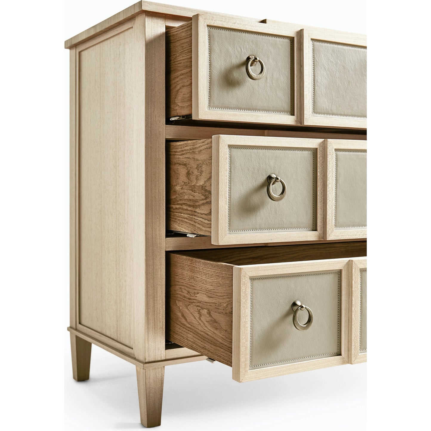 007 SI-2186251 | Closeup | Water Neap Leather Front Chest by Jonathan Charles in ash blonde. Made from died koto veneer, leather, brass in a transitional style.
