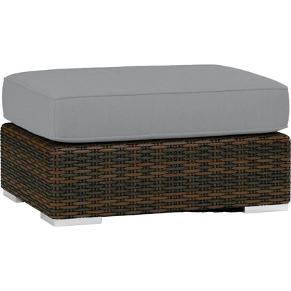 Montecito Outdoor Ottoman by Sunset West in cognac. Made from resin wicker in a modern style.