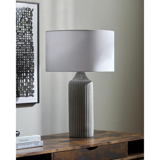 Urra Accent Table Lamp by Livabliss in gray and hand painted. Made from concrete, linen, iron in a unique style.
