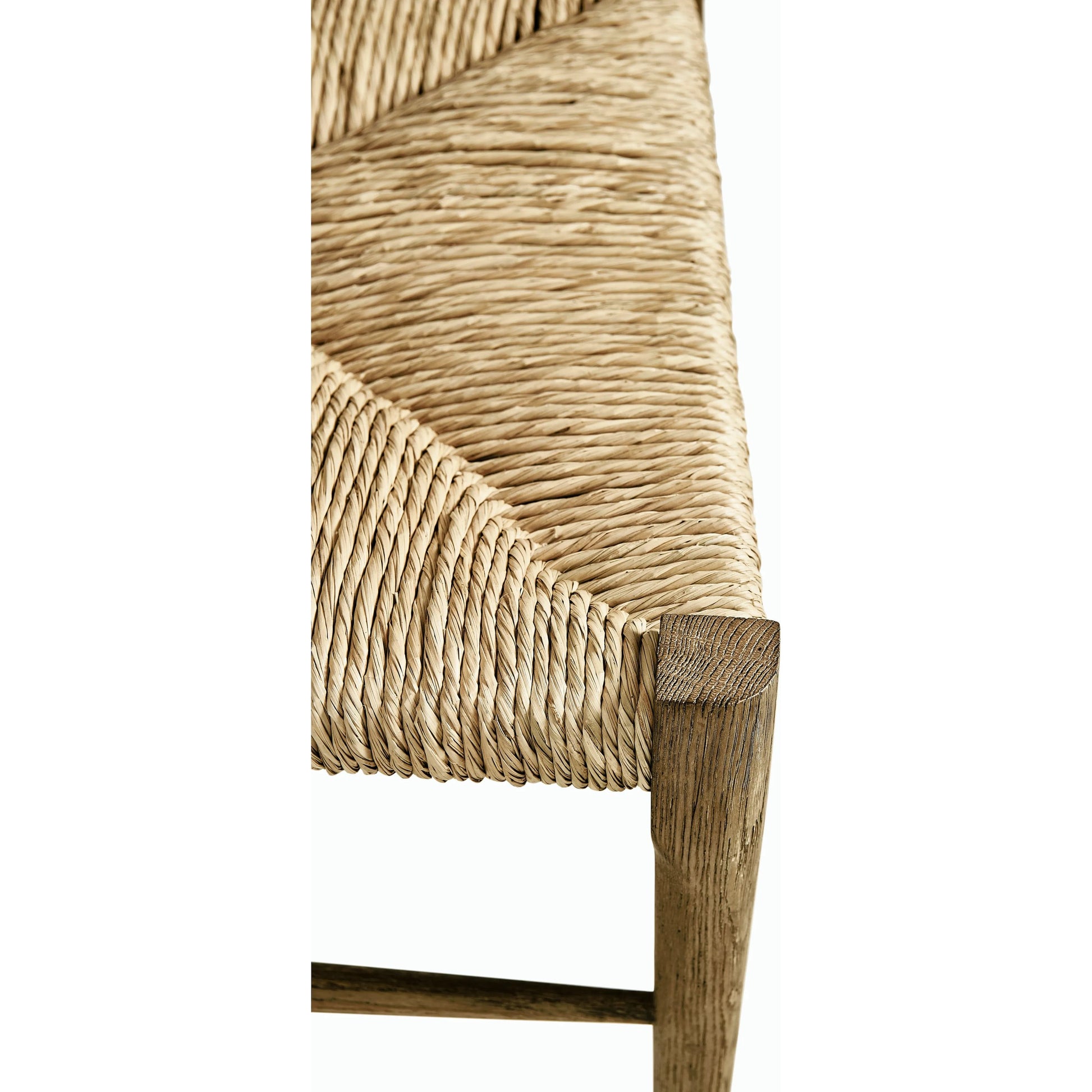 Timeless Doppler Ladderback Side Chair by Jonathan Charles in brown. Made from oak, fiber rush, foam, fabric in a coastal style.