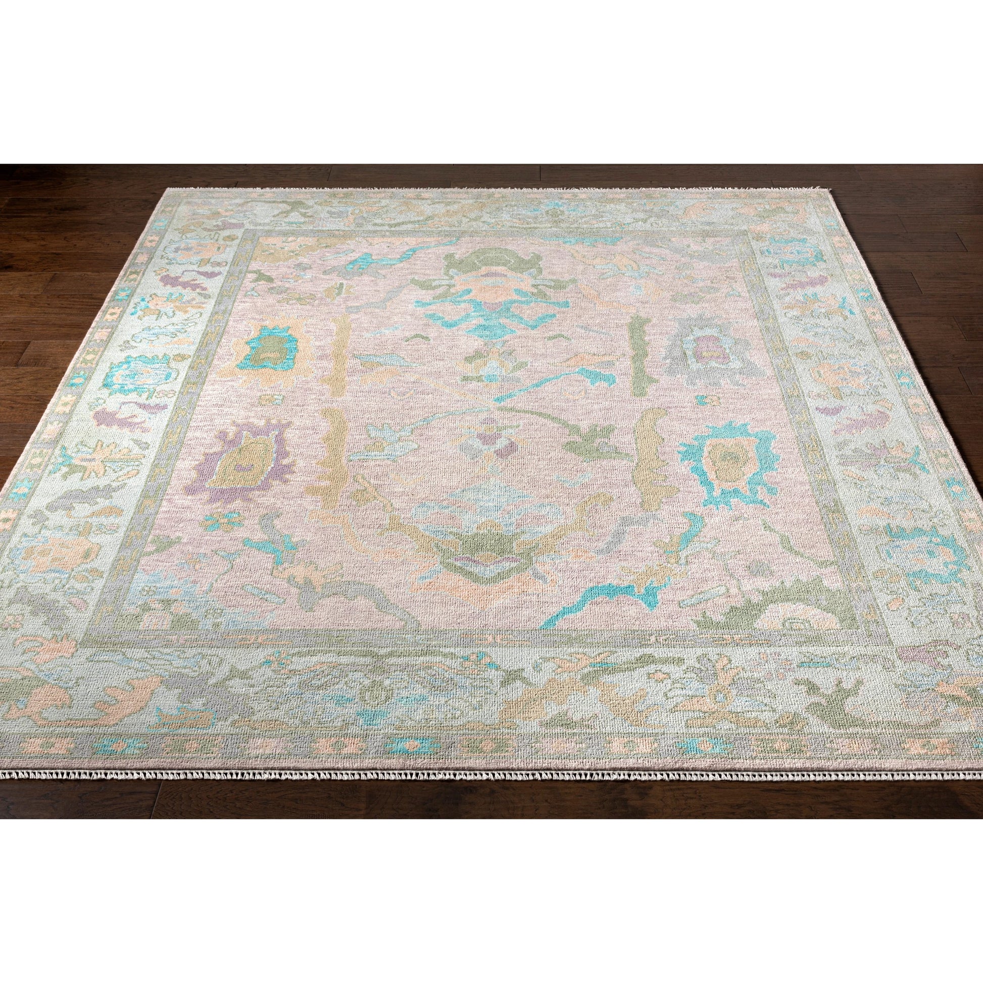 Ushak Rug - 26649 by Surya in light blue, blush, lilac, sage, ice blue. Made from 100% wool in a unique style.